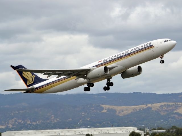 Airbus A330-300 (9V-STP) - Getting airborne off runway 23 and heading home to Singapore. Tuesday 27th December 2011.