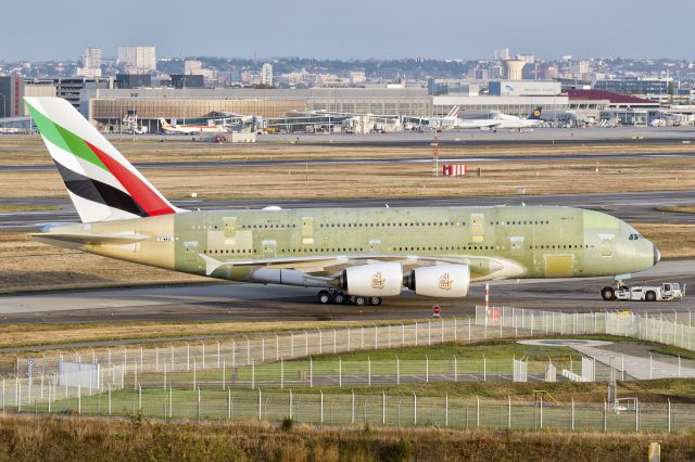 Airbus A380-800 (A6-EUR) - 25th Oct., 2016 : Still wearing the pre-delivery registration of F-WWAE (MSN 0232), Emirates Airbus A380 is seen being towed at the Airbus assembly plant in Toulouse, France. Her first flight was three days after this shot was taken and she is yet to be delivered as of time of publication of this photo (10th Feb., 2017). 