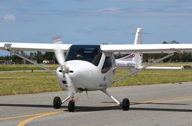 Experimental 100kts-200kts (N113GX) - Locally-based Remos light sport taxing out for departure at Reid Hillview Airport.