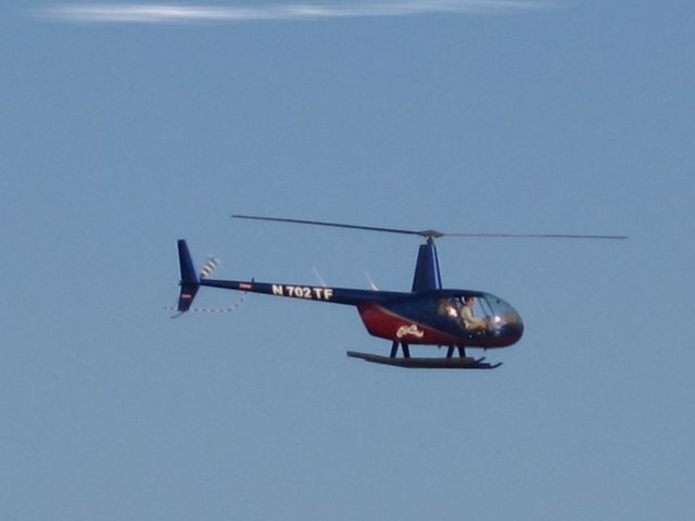 — — - This two seater helo is taking visitors around the Atlantic City Highlights shown here in the Spring of 2013.