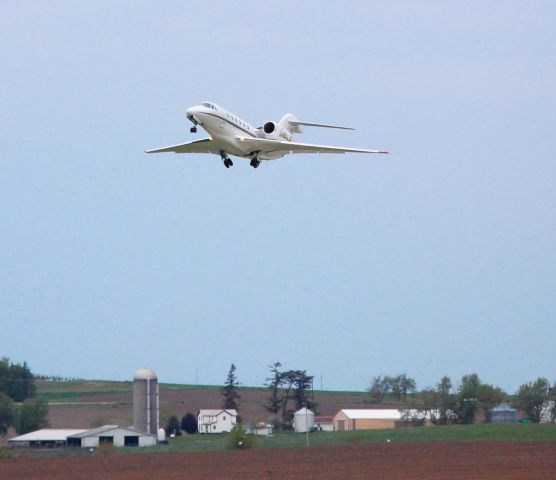 Cessna Citation X (N904QS) - NetJets Citation X clearing runway 31 at KDBQ on 05-23-08.