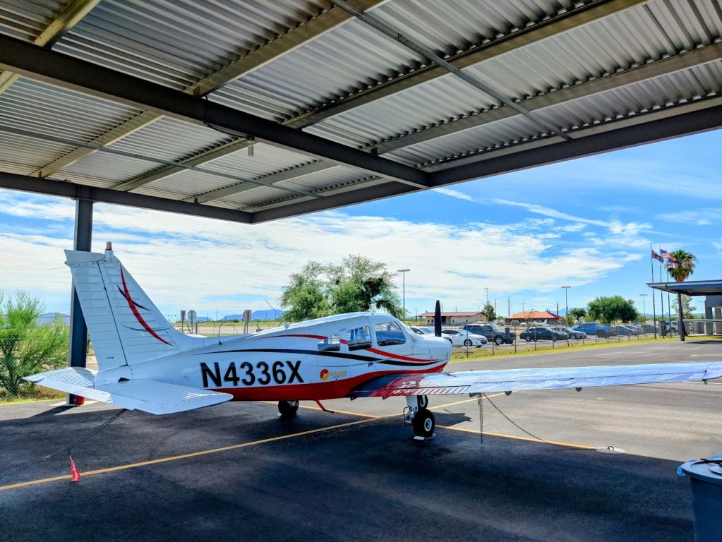Piper Cherokee (N4336X) - Nice and quiet mornin at Tucson-Ryan Airfield. Three six Xray sits on the ramp awaiting her next journey. 