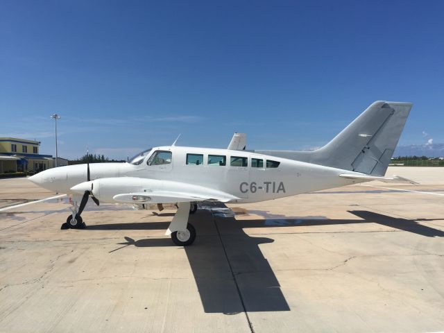 Cessna 402 (C6-TIA) - Cessna 402C C6-TIA Parked at Odyssey Aviation MYNN