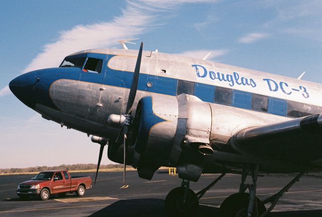 Douglas DC-3 (N33VW) - This C-47 was built as a Douglas C-47A-90-DL Skytrain, USAAF s/n 43-15935, msn 20401. It was declared surplus in 1946 according to Joe Baughers information. The aircraft went thru a succession of registrations and owners until 1998 when sold to Vintage Wings and Things of Carencro, Louisiana and registered as N33VW. It was sold to the Cavanaugh Flight Museum, Addison, Texas in 2009 and retains the FAA civil registration of N33VW. Photo was taken at KLFT, Lafayette Regional Airport, circa 2000. The aircraft has since been repainted in a "WWII D-Day" livery, with "invasion stripes".