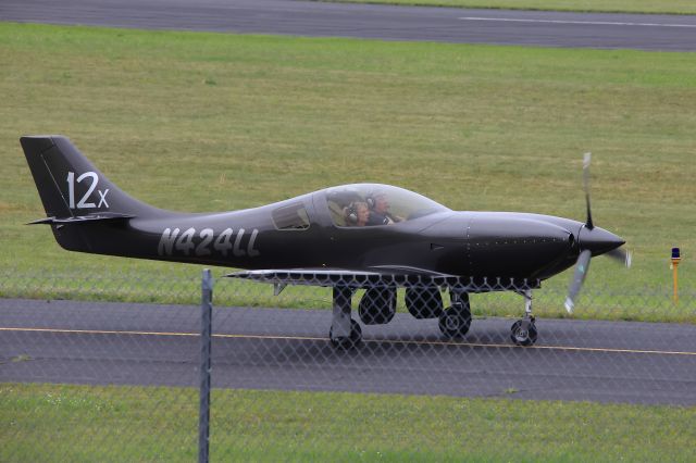 Lancair Legacy 2000 (N424LL) - Morning taxi for AirVenture Cup, 21 July 2024.