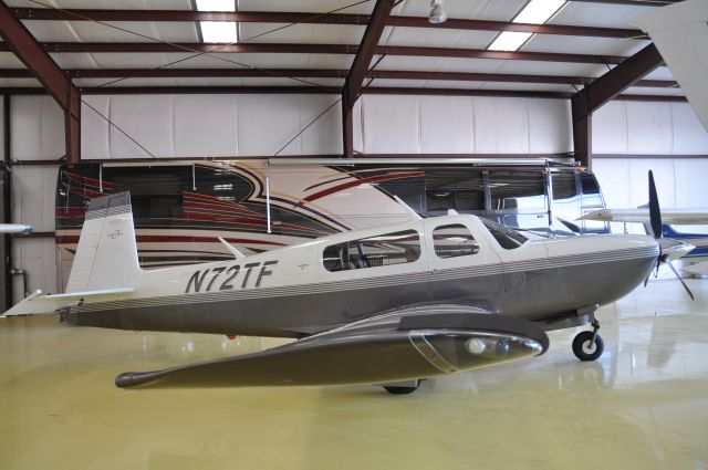 Mooney M-20 (N72TF) - In the hangar looking at the nice paint job on this speed demon.