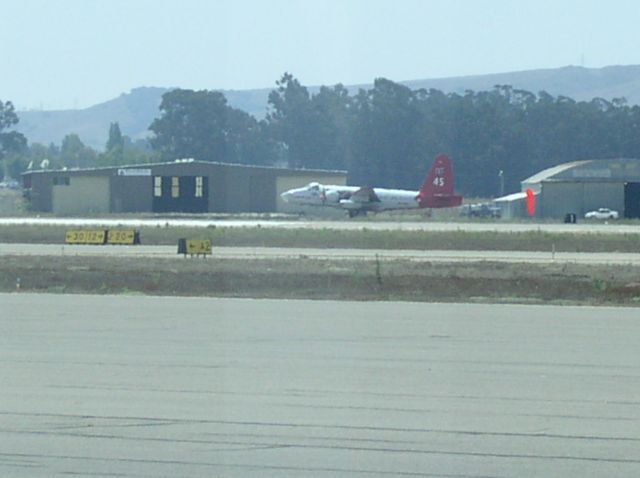 — — - Fire jet fighting local wildfire