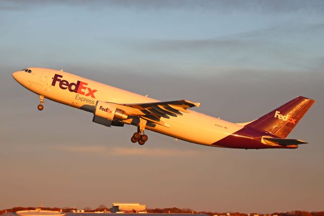 Airbus A300F4-600 (N748FD) - A colorful early morning departure from RWY 24L for FDX427 Heavy on 21 Nov 2017.