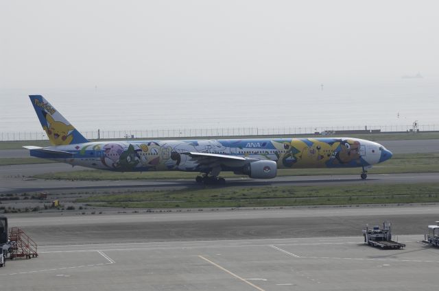 BOEING 777-300 (JA754A) - Taxing at Haneda Intl Airport on 2012/05/08 "Pokemon c/s"