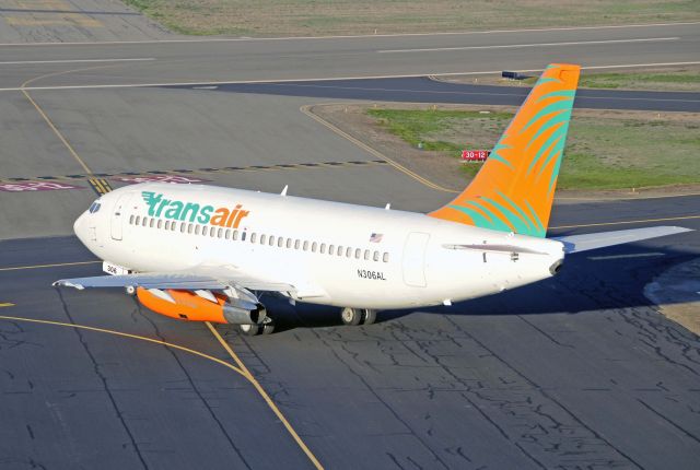 Boeing 737-700 (N306AL) - Taxiing out to runway three-zero for departure