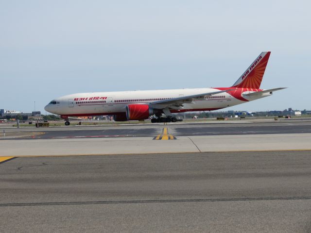 Boeing 777-200 (VT-ALF) - "Virgin Atlantic Cargo Area" on Airis Road at Newark Liberty International Airport KEWR/EWR. Shot on May 5, 2013. Air India Flight 144 taxiing for takeoff on Runway 22R, headed to Chhatrapati Shivaji International Airport CSIA/BOM.