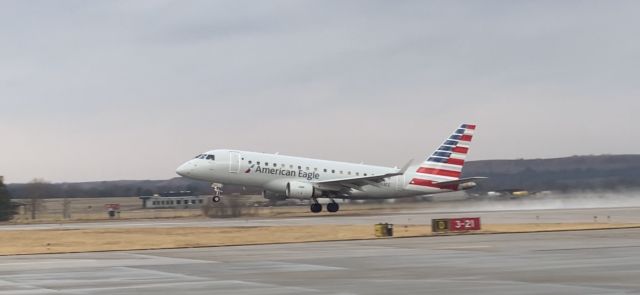 Embraer 170/175 (N763CC) - I've worked at MHK for 6 years, and for 6 years I've been trying to achieve a photo like this with the water spray on takeoff!!!!