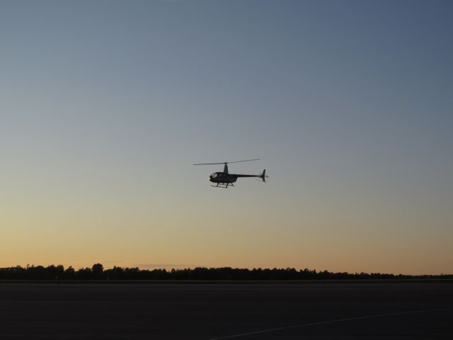 Robinson R-44 (C-FFRT) - Kouris kopters inc. R44 taking off from kingston on a warm summer night