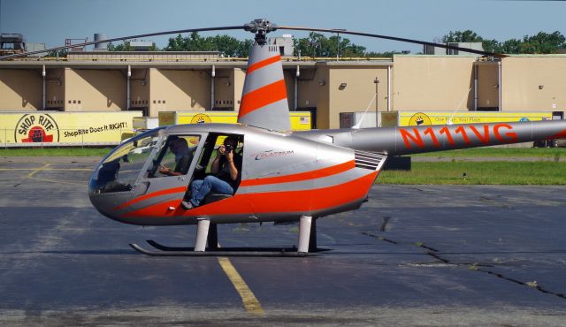 Robinson R-44 (N111VG) - LINDEN, NEW JERSEY, USA-AUGUST 29, 2019: Seen on the ground at Linden Airport preparing for take off shortly after refueling.