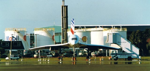 Aerospatiale Concorde — - Air France Concorde photographed in the film days at the Christchurch International Airport Visit 1994.<br>To photograph from this angle, I was lying down on the ashphalt apron like a sniper does, over near where the Canterbury Aeroclub used to be located. The lens was resting on the camera bag. Concorde was about 200-300m away. Ive always been annoyed that the fuel tanks are right behind her. Despite that, Ive always loved the gorgeous curves of the delta wings!