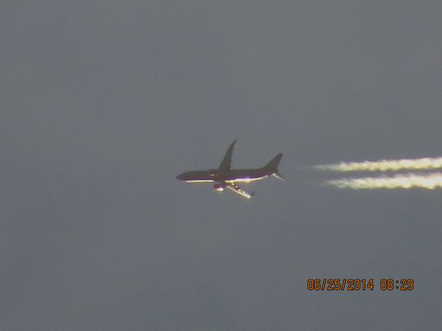 Boeing 737-800 (N8313F) - Southwest flight 2316 from Midway Chicago to Houston over Baxter Springs Ks 38,000 feet.