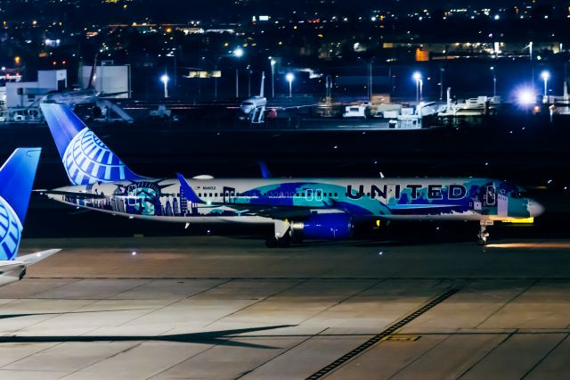 Boeing 757-200 (N14102) - United Airlines 757-200 in Her Art Here (Antonelli - NJ/NYC) special livery taxiing at PHX on 1/6/22. Taken with a Canon R7 and Tamron 70-200 G2 lens.