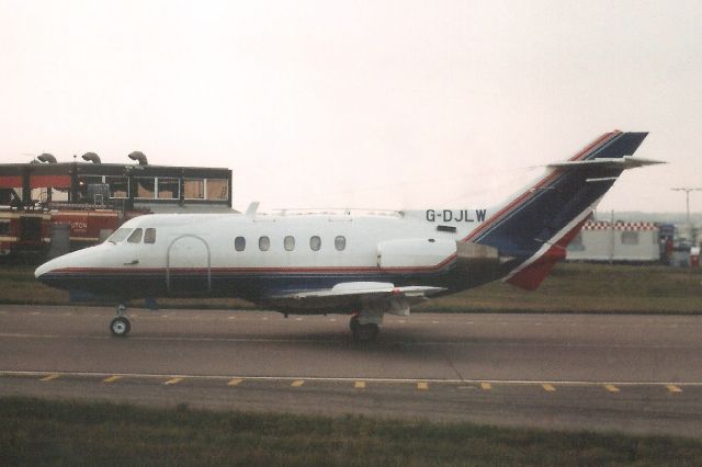 Hawker Siddeley HS-125-400 (G-DJLW) - Taxiing for departure in Sep-98.br /br /Transferred to Bahamas 16-Dec-99 as C6-MED,br /then reregistered N140LF 2-Sep-05,br /Registration cancelled 23-Oct-08.br /Broken up at Rantoul KS.