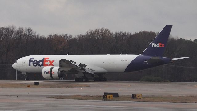 BOEING 777-200LR (N892FD) - Just touched down on 18R.