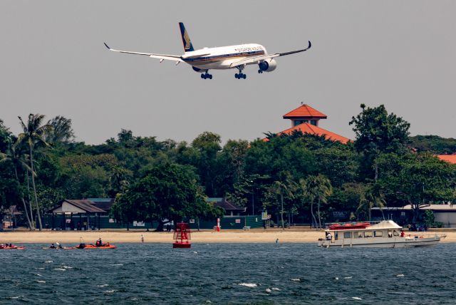 Airbus A350-900 (9V-SMN) - Singapore Airlines A350-900 crosses low over Changi Beach on final for Changi Airport.