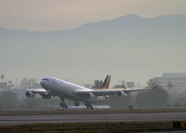 Airbus A340-300 (RP-C3436) - Early morning arrival to Los Angeles (LAX) on runway 24R. 9 April 2014