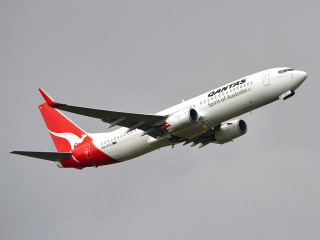 Boeing 737-800 (VH-VYG) - Getting airborne off runway 23 on a cold, gloomy winters day. Wednesday 4th July 2012.