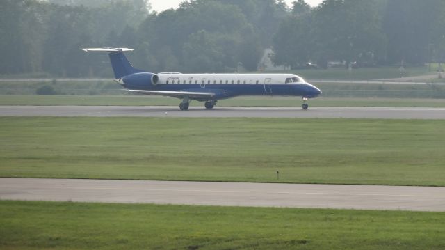 Embraer ERJ-145 — - The suspicious plane I always saw driving by the airport, but never did I shoot it before now! Very cool paint in my opinion!