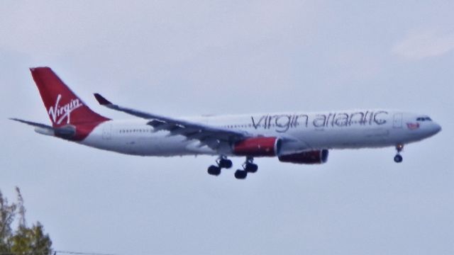 Airbus A330-300 (G-VINE) - Arriving from London"Heathrow"(LHR/EGLL) On a hazy hot afternoon