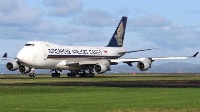 Boeing 747-400 (9V-SFO) - Taxiing for morning departure.