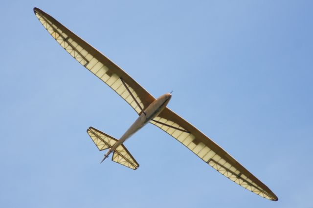 — — - Flying over Old Warden Aerodrome.