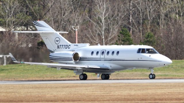 Hawker 800 (N777DC) - Beautiful Hawker 900XP on the roll on Runway 21L.