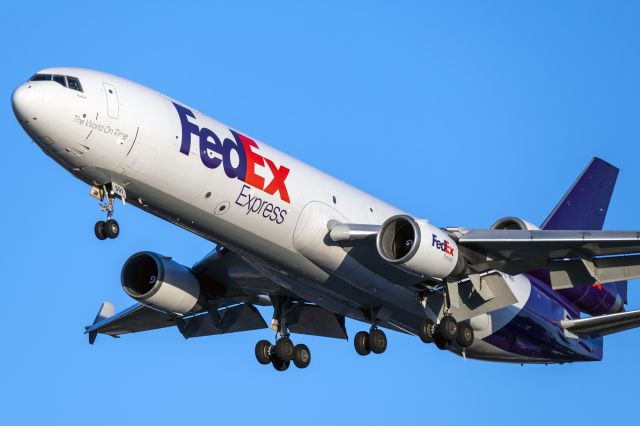 Boeing MD-11 (N591FE) - FedEx 379 Heavy arriving via 31L