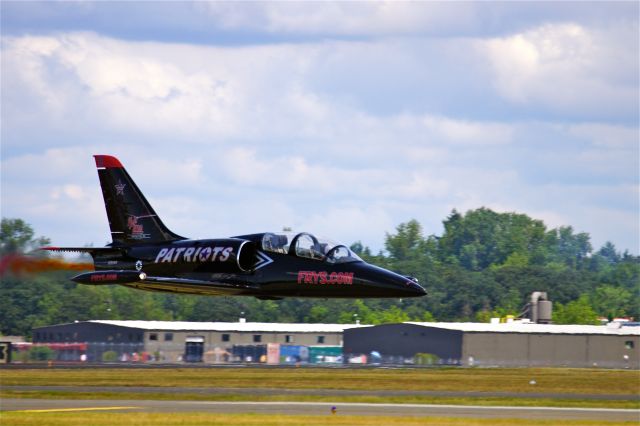 Aero L-39 Albatros — - July 21 2012, One of the civilian Patriots Jet Team member skimming the runway at about 500mph.