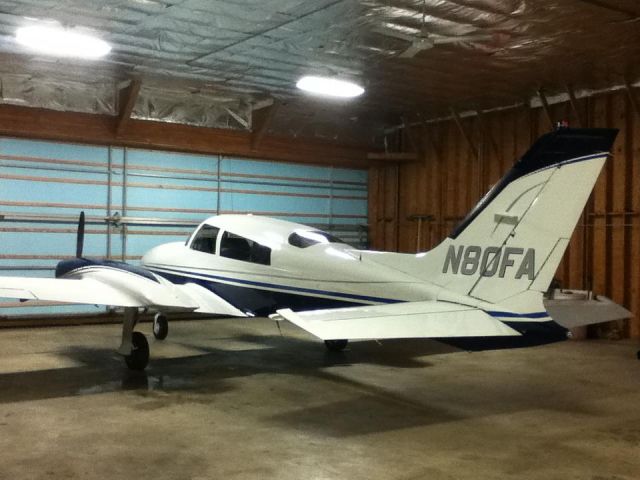 Cessna 310 (N80FA) - In the hangar after a quick wash.