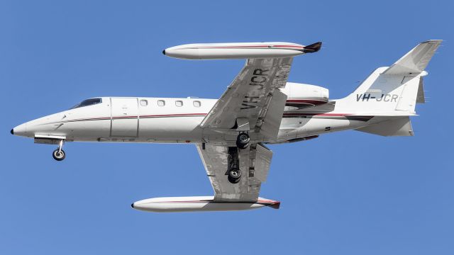 Learjet 35 (VH-JCR) - LearJet, on approach to runway 01 at YBTL.