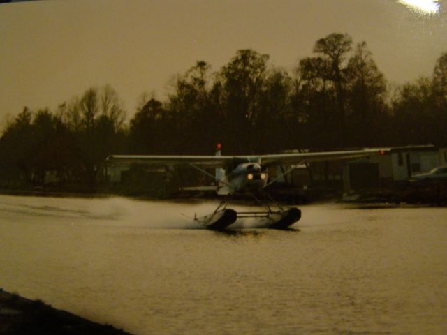— — - 180 floatplane landing at Westwego Airport.