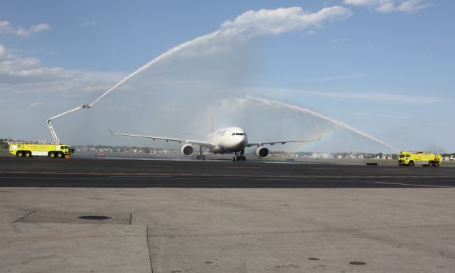 Airbus A330-300 (TC-JNN) - Turkish inaugural arrival to Boston Logan under a water canon salute.