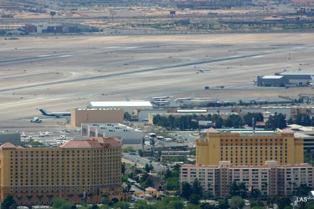 — — - KLAS - UFO fleet of 737s at Las Vegas waiting for Area 51 passengers. April 3rd, 2005. photo from the Stratosphere Tower/Casino w 100-400mm IS L lens,