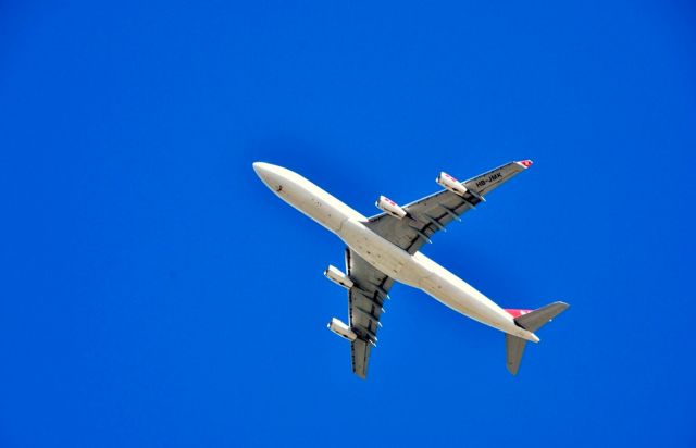 Airbus A340-300 (HB-JMK) - Swiss Airlines Airbus 340-300 over Zurich-Kloten International Airport.