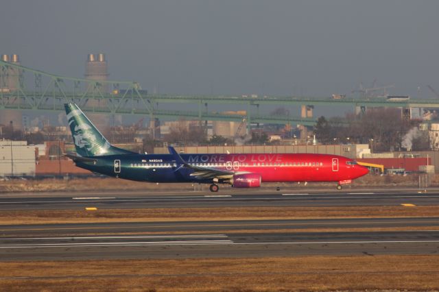 Boeing 737-900 (N493AS) - More to Love departing Boston Logan for Seattle on a warm winter morning - February 23, 2017