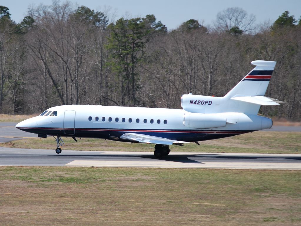 Dassault Falcon 900 (N420PD) - PPD AERONAUTICS LLC departing runway 20 at KJQF - 3/14/14