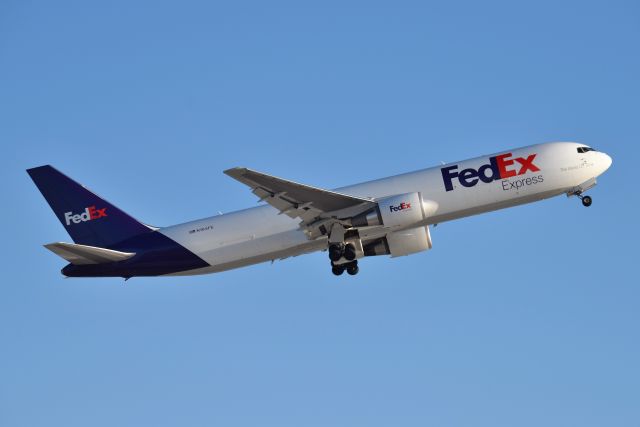 BOEING 767-300 (N165FE) - Departing 23-L on 02-03-21