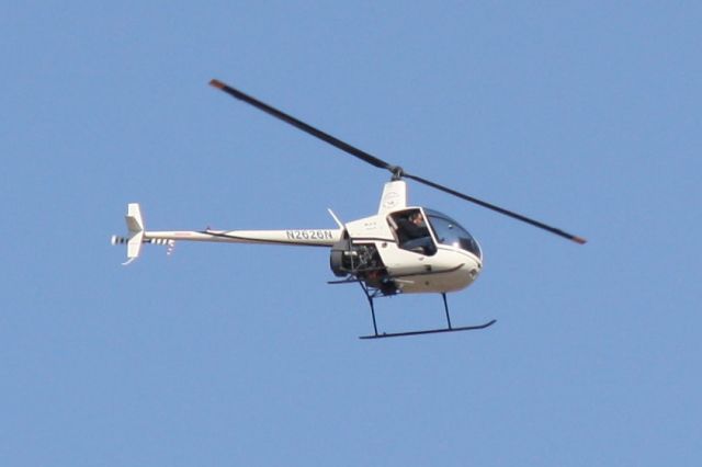 Robinson R-22 (N2626N) - N2626N flying over Sarasota-Bradenton International Airport