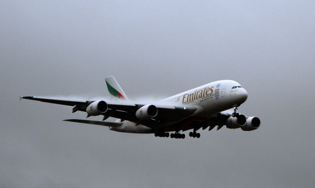 Airbus A380-800 (A6-EOK) - Emirates A380 landing at Melbourne Airport from the East. Condensation is visible along the length of the wing. Sunday, ‎March ‎13, ‎2016, ‏‎08:42 AEST.