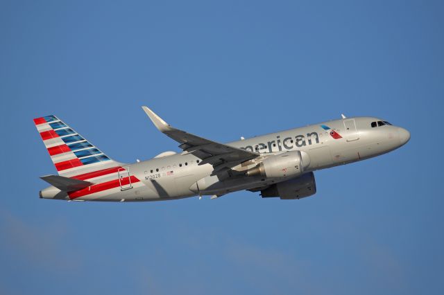Airbus A319 (N12028) - Departing RWY 6R on the morning of 5 Dec 2020.