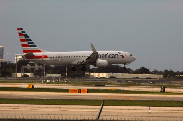 Boeing 737-800 (N959AN) - AA flaring over 10L at Fort Lauderdale.