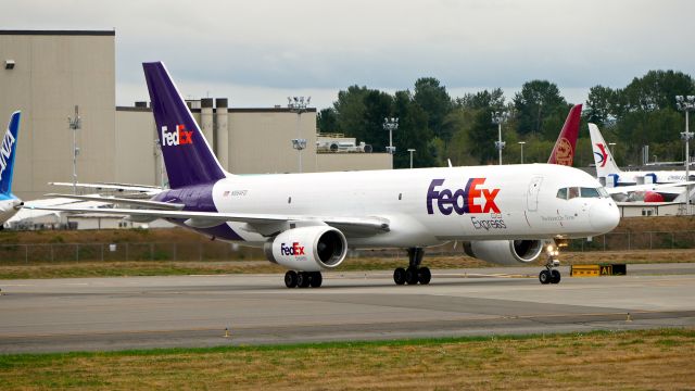 Boeing 757-200 (N964FD) - FDX925 from MEM taxis across Rwy 16R on 9.10.21. (B757-258(SF) / ln 325 / cn 24884). This is the first FDX freighter to arrive at the new Paine Field FedEx facility. 