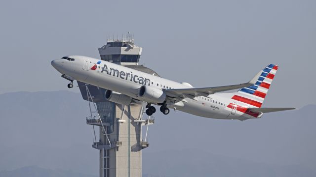 Boeing 737-800 (N964NN) - Departing LAX on 25R