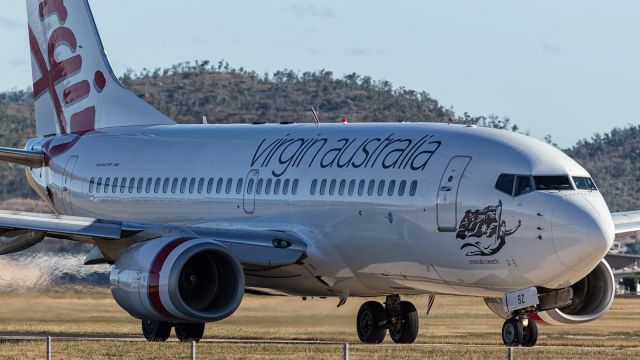 — — - Virgin B737-700, taxies to runway 19 at YBTL.