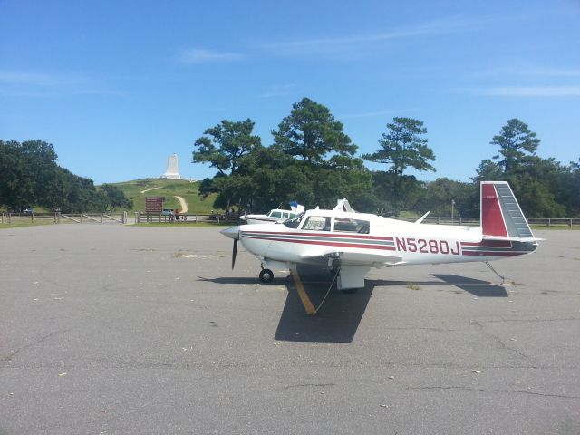 Mooney M-20 (N5280J) - Visit to First Flight Airport.  Wright Monument in background.